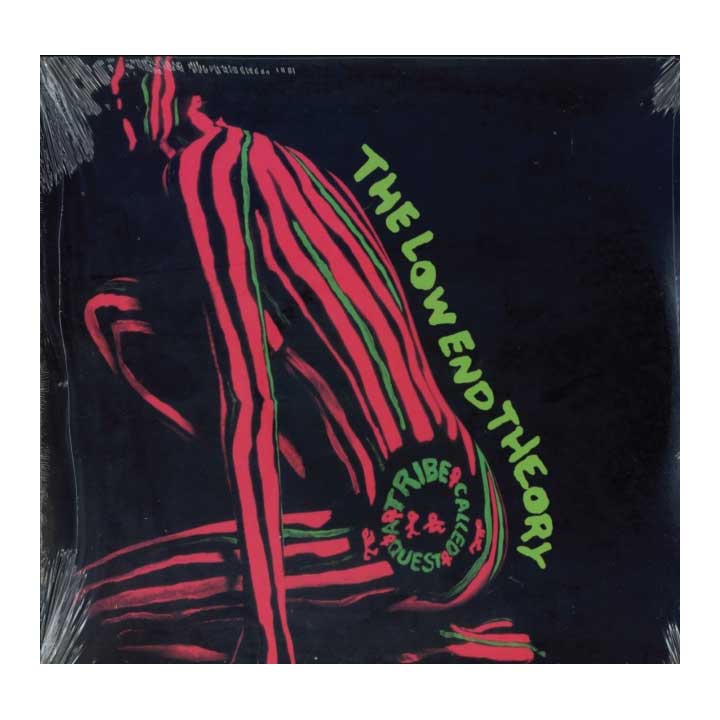 painted woman on black background. the low end theory written