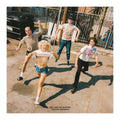 Four people running playfully in an outdoor urban alleyway under bright sunlight. The image has a warm, filtered vintage aesthetic and features the text 'ARYL AND THE SNIFFERS CARTOON DARKNESS' at the bottom.
