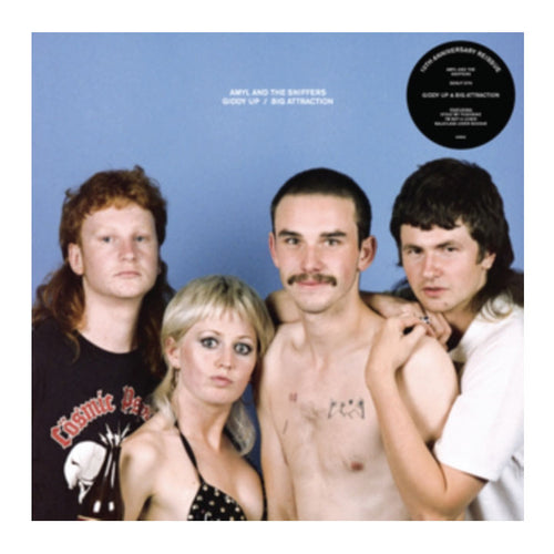 Album cover for Anty and the Skuffers' 'Ghosts of a Big Attraction', featuring four band members against a blue background with a black vinyl record sticker in the top right corner.