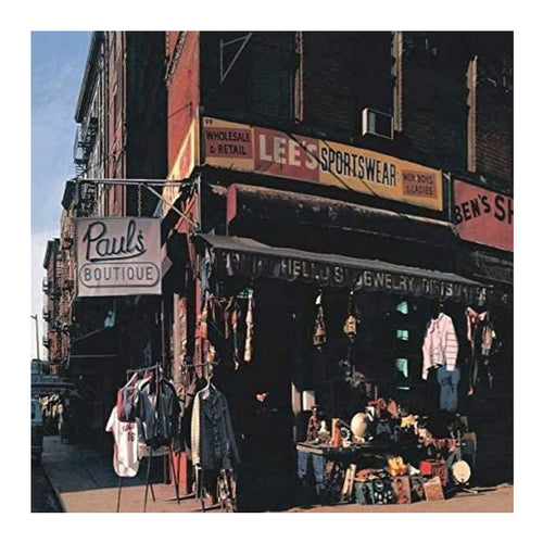 Street scene with vintage clothing store and signs in an urban setting