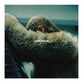 Album cover art for Lemonade, featuring a close-up of a person in a knit cap resting their head on a fur-lined surface, with the title 'LEMONADE' in white text across the center.