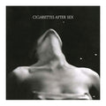 Cigarettes After Sex albu cover with that text. black and white photo of a woman with head tilted back