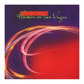 Cocteau Twins Heaven Or Las Vegas album cover with those words and a colorful overexposed picture