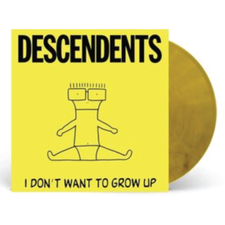 A vinyl record partially visible behind its square album cover, which is bright yellow with bold black text reading 'DESCENDENTS' and 'I DON'T WANT TO GROW UP' plus a simple line drawing of a seated figure. The record itself appears translucent gold.