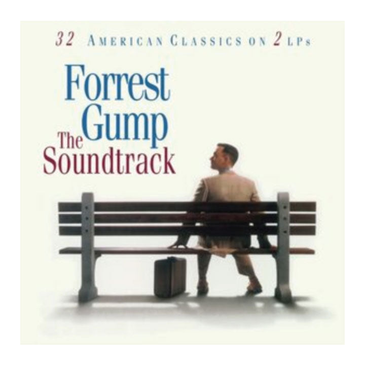 Album cover for 'Forrest Gump The Soundtrack' featuring the title text on an off-white background and a seated man on a bench with a suitcase.