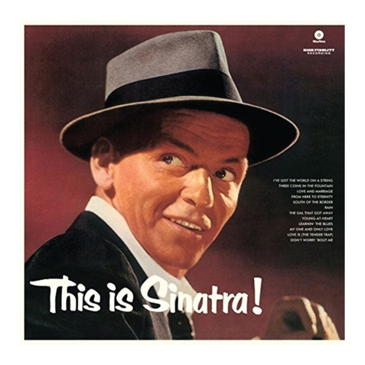This is Sinatra! album cover artwork featuring a portrait of Frank Sinatra wearing a gray fedora and dark suit against a dark red background, with the title in large white text at the bottom.