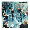 Album cover with people sitting around a glass table in a reflective room, featuring the text 'Fripp & Eno No Pussyfooting'.