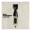 Album cover with a bomb-like object and 'Foo Fighters' text on a textured background