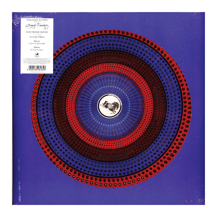 Vinyl record with a colorful concentric circle design on a purple background