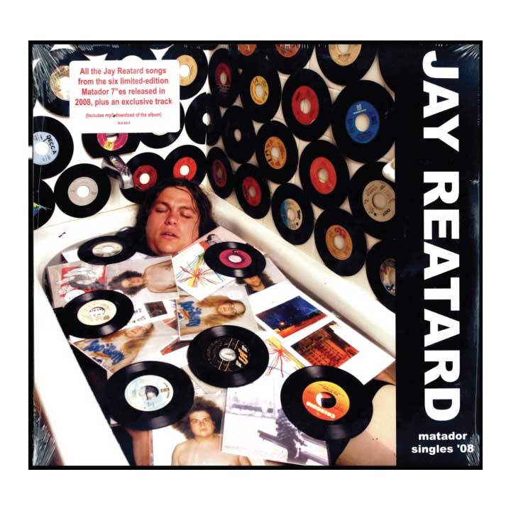 Vinyl record album cover with a person lying among records, featuring the text 'Jay Reatard' and 'matador singles '08'.