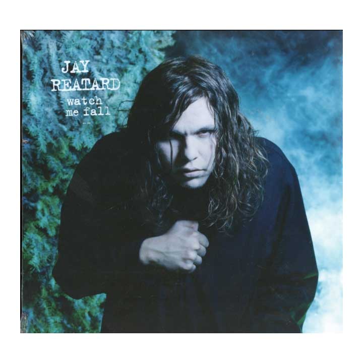 Album cover with a person and text 'Jay Reatard Watch Me Fall' against a blue and green abstract background.