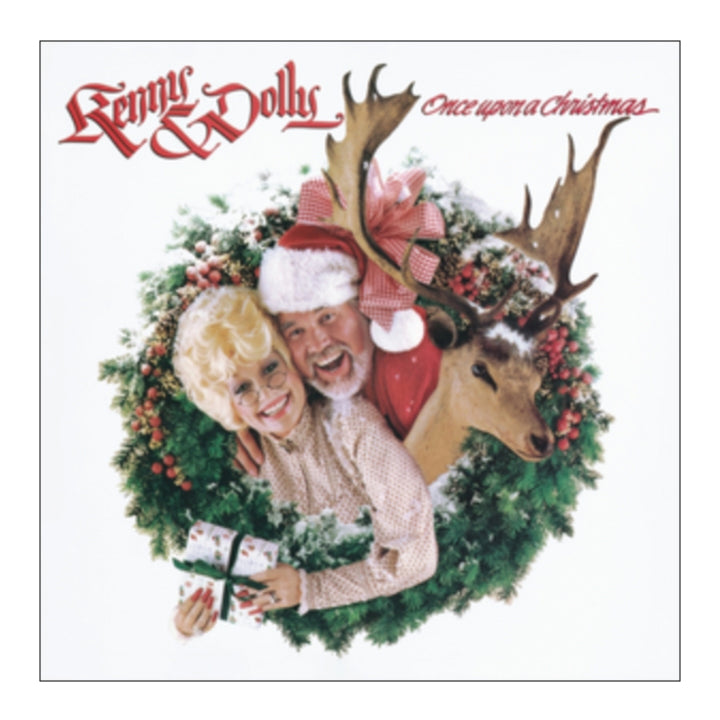 kenny, dolly and a reindeer in a wreath