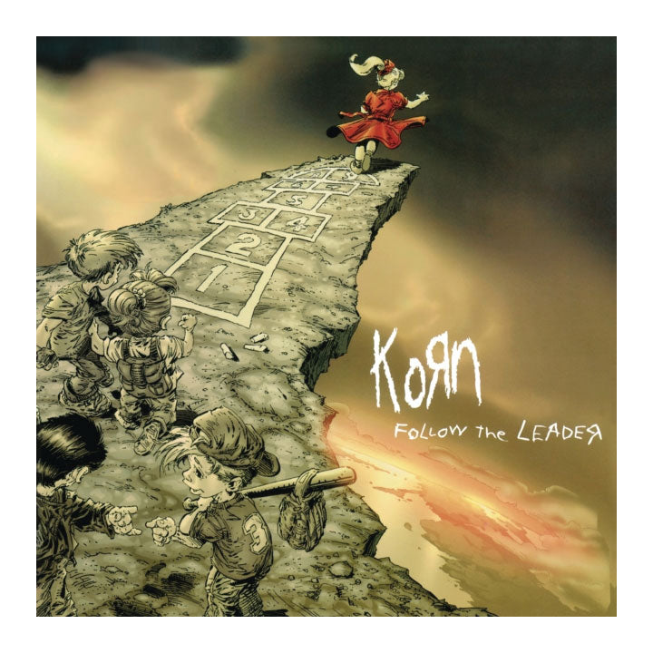album cover of Korn- Follow the leader featuring the words and a cartoon of a child op scotching off of a cliff