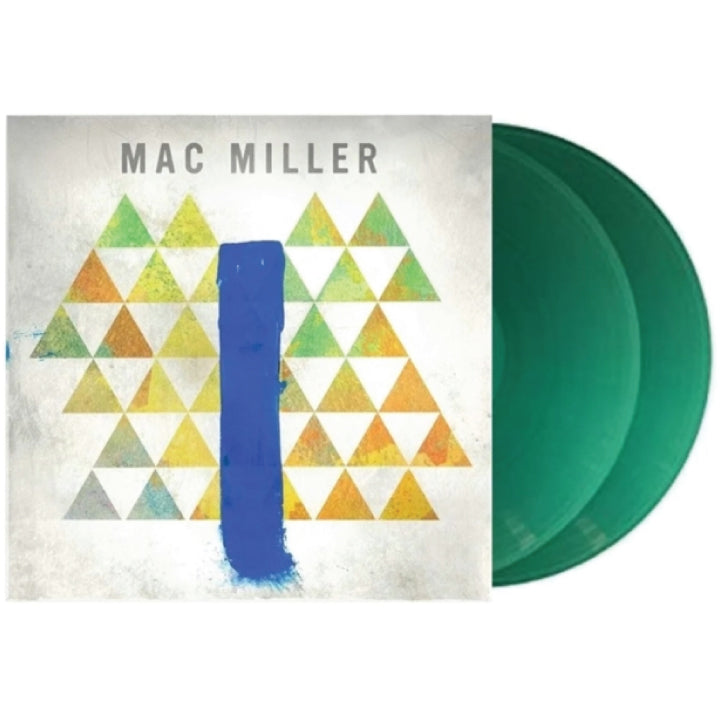 Mac Miller vinyl record album with a textured off-white cover featuring a blue vertical brushstroke and a geometric triangle pattern in green, yellow, and orange, shown next to two translucent green records.