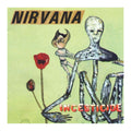 Album cover for Nirvana's 'Incesticide' with alien and poppy design.