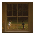 Two children playing in a field as seen through a window.