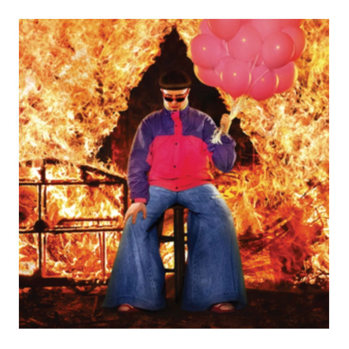 A stylized portrait of a person seated on a stool in front of a large fire, wearing a purple and pink jacket, blue wide-leg pants, and sunglasses, while holding a cluster of pink balloons.