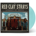 The Red Clay Strays 'Moment of Truth' vinyl record album with a light blue translucent record partially visible behind the square black-and-white cover art.