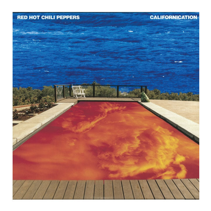 Album cover of 'Californication' by Red Hot Chili Peppers featuring a pool with fiery design and blue sky.
