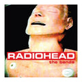 Album cover of Radiohead's 'The Bends' with a close-up of a person's face.
