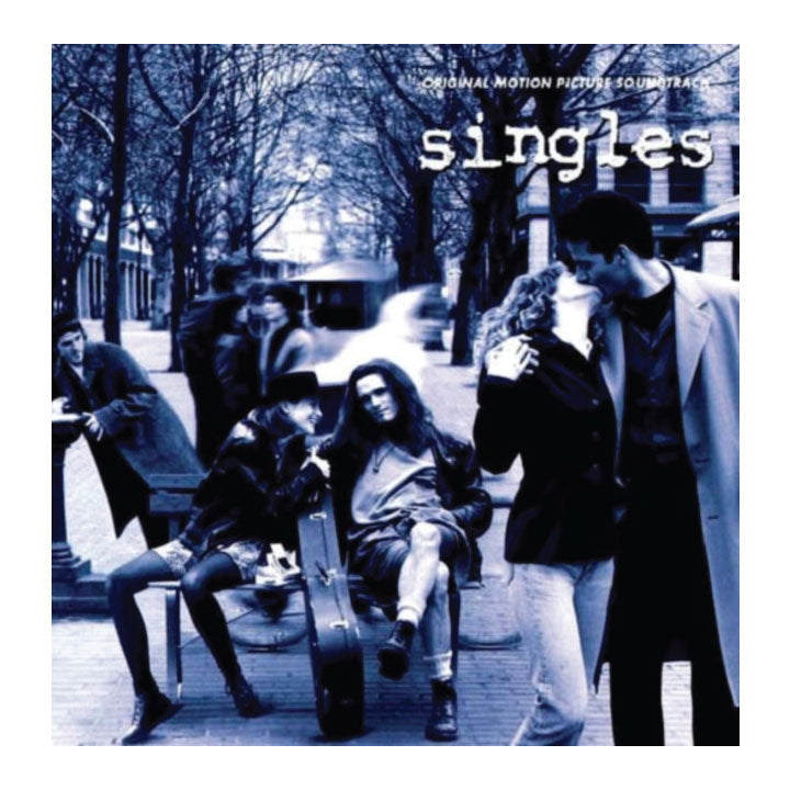 Single album cover for the motion picture soundtrack, featuring a blue-toned photograph of people sitting and standing on a city street, with the title 'singles' in white text at the top.