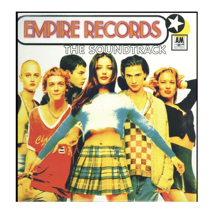 6 youthful folks  standing side by side. text that reads empire records the soundtrack