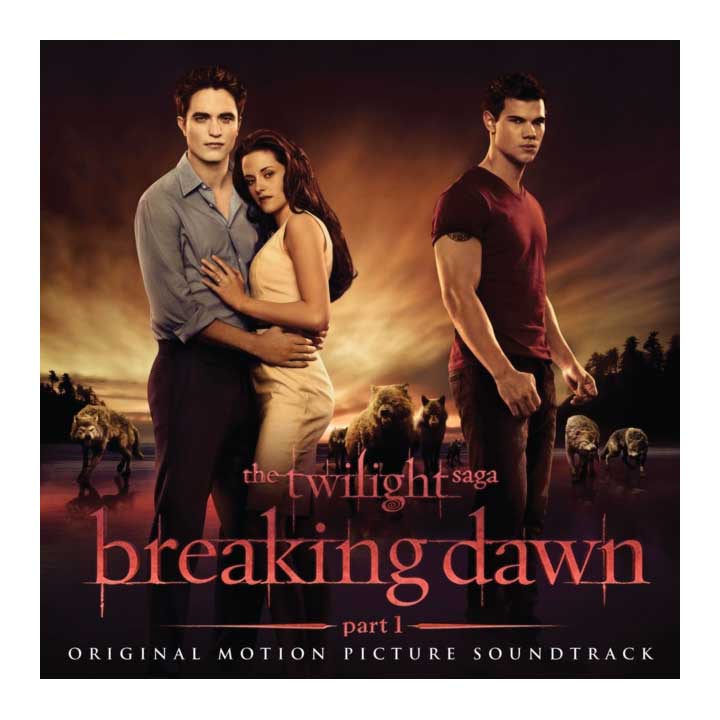 Album cover for 'The Twilight Saga: Breaking Dawn Part 1' soundtrack featuring three characters and wolves.