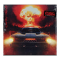 Sturgill Simpson's 'sound and furyl' vinyl LP cover, sealed in plastic shrink wrap. The artwork features a black muscle car with glowing headlights facing a massive fiery explosion over a dark city skyline.