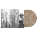 Vinyl record with cover featuring a person in a forest
