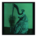 Silhouette of a woman playing a harp on a green background