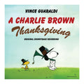 Square album cover for 'A Charlie Brown Thanksgiving' original soundtrack recording by Vince Guaraldi, featuring Snoopy and Woodstock in Pilgrim hats against a light blue sky and green grass.