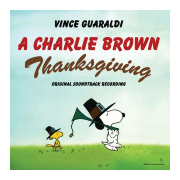 Square album cover for 'A Charlie Brown Thanksgiving' original soundtrack recording by Vince Guaraldi, featuring Snoopy and Woodstock in Pilgrim hats against a light blue sky and green grass.