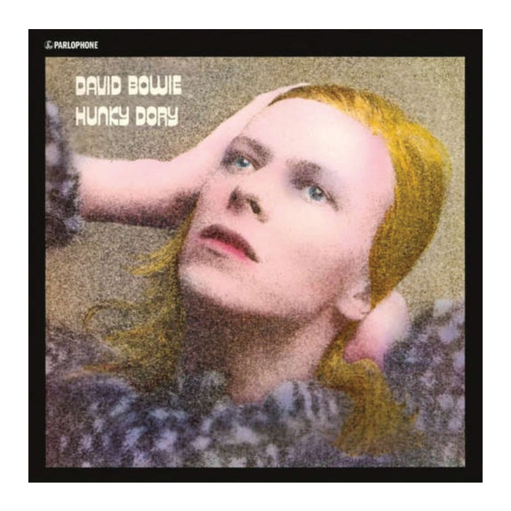 David Bowie 'Hunky Dory' Vinyl Record album cover, featuring a close-up portrait of Bowie with yellow hair and a textured, grainy aesthetic, framed by a black border with the title and artist name visible.