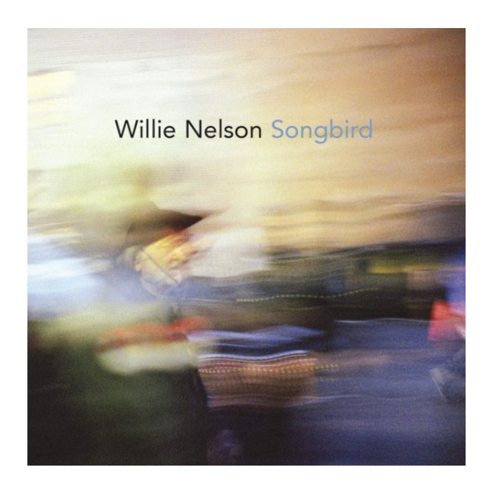 vinyl record cover for Willie Nelson's 'Songbird' featuring an abstract, motion-blurred painting with the text 'Willie Nelson Songbird' at the top.